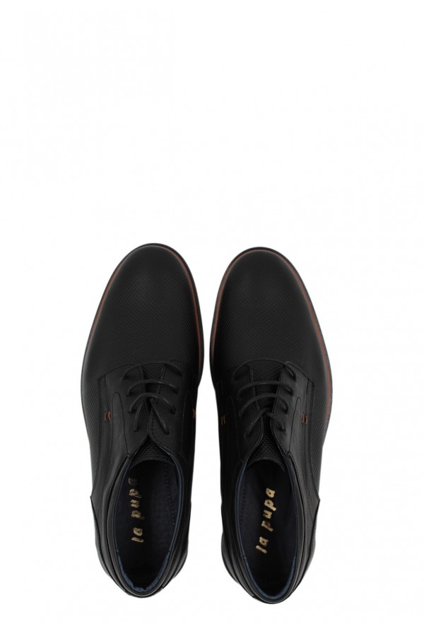 Man’s  black shoes