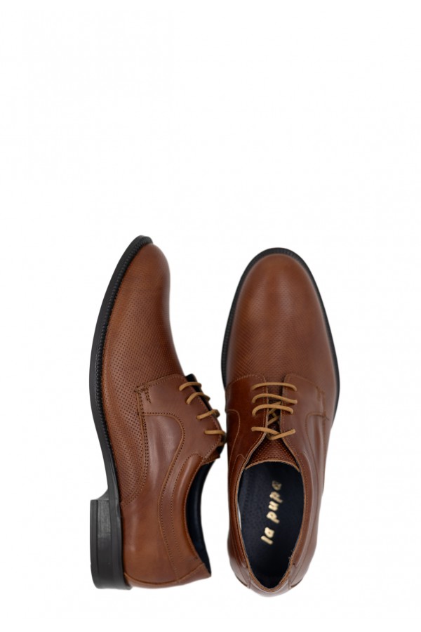 Man’s cognac shoes