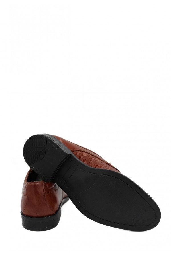 Man’s cognac shoes