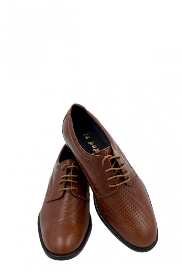 Man’s cognac shoes