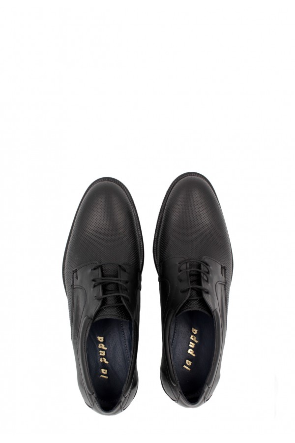 Man’s  black shoes.