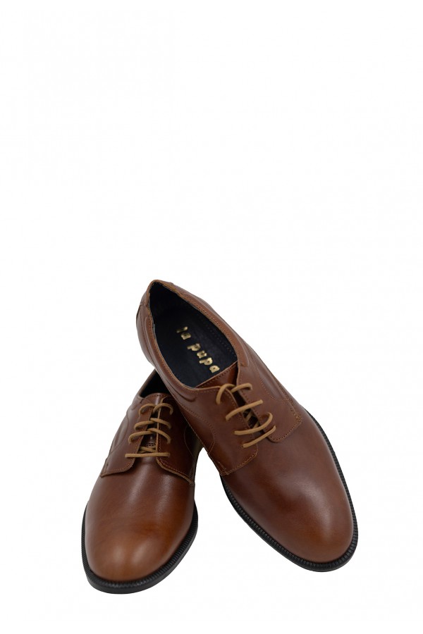 Man’s cognac shoes