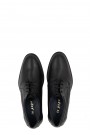 Man’s black shoes