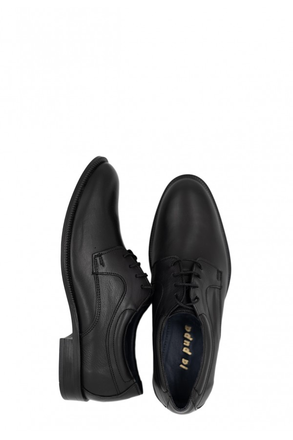 Man’s black shoes