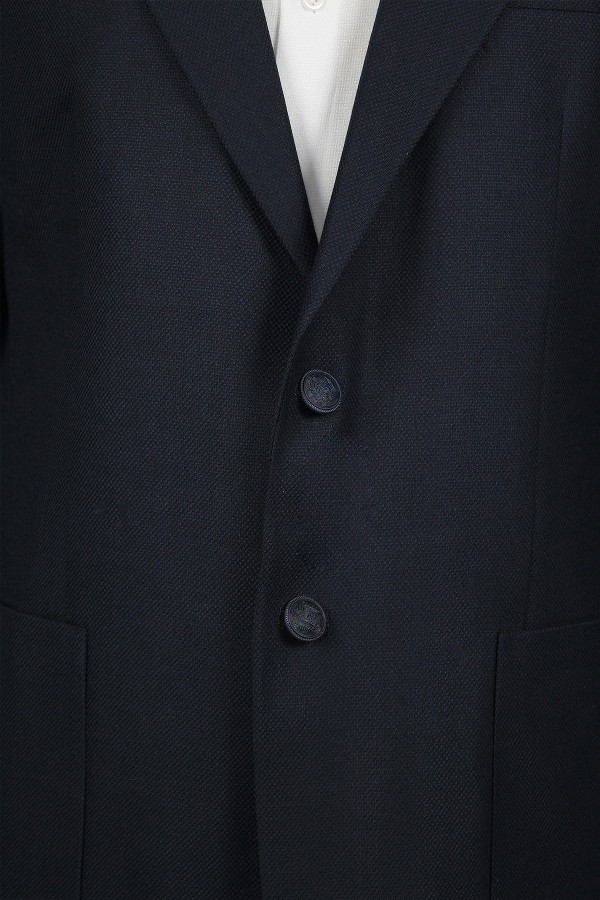  Man’s dark blue Blazer with detailed pockets 