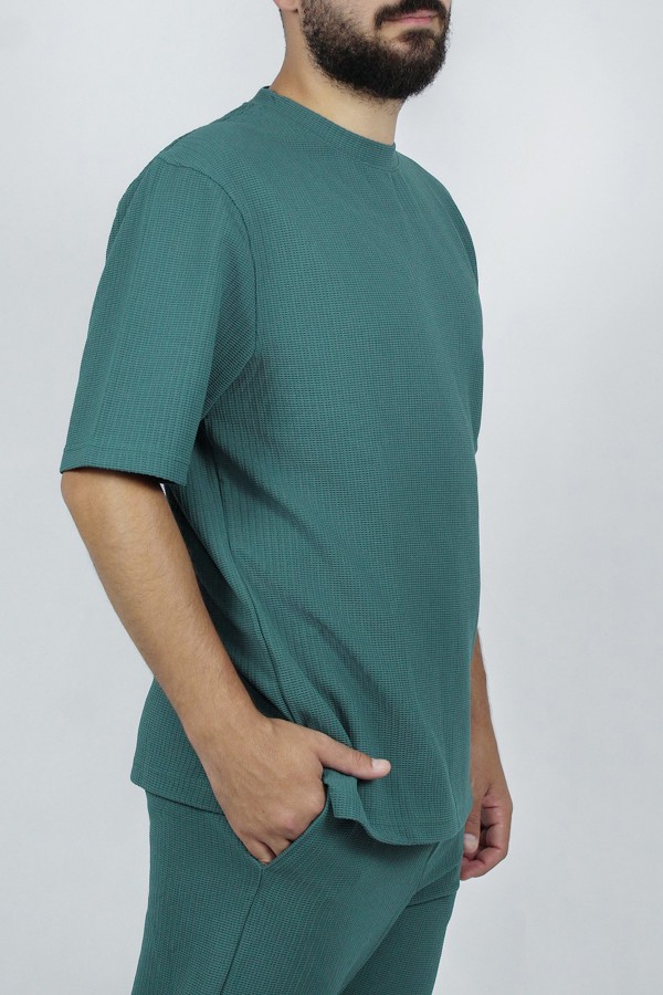 Man’s green oversized t-shirt