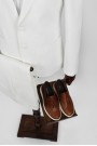 Man's white linen suit