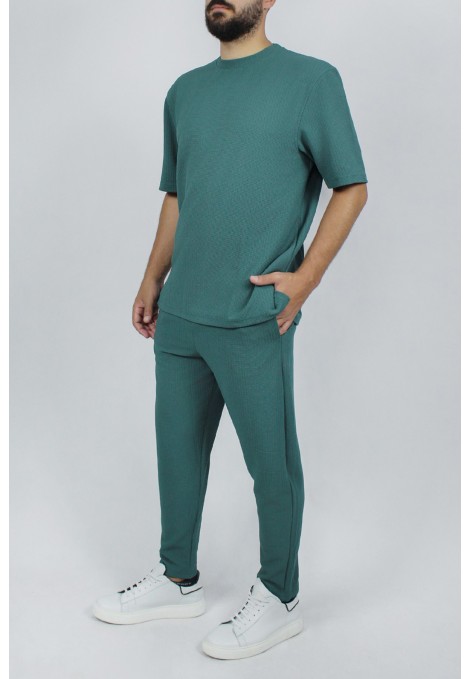 Man’s green rip trousers with elastic waist