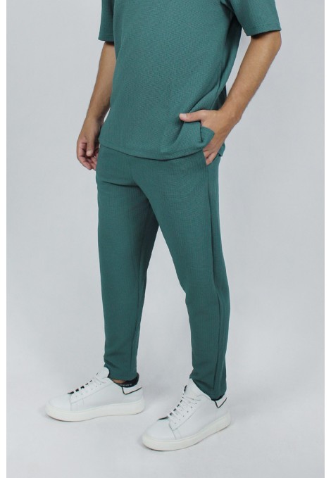 Man’s green rip trousers with elastic waist