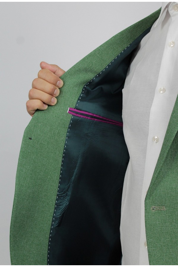 Man’s green blazer with detailed pockets mixed wool