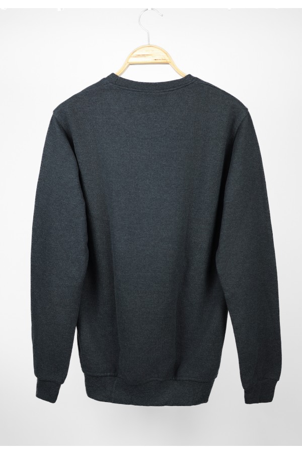 Man’s dark blue long sleeve sweater