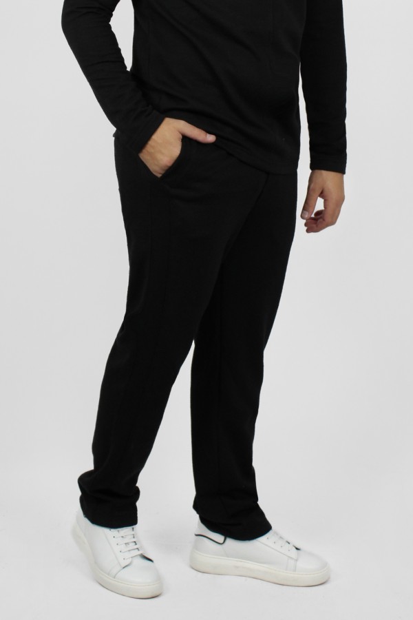 Man's black oversize pants